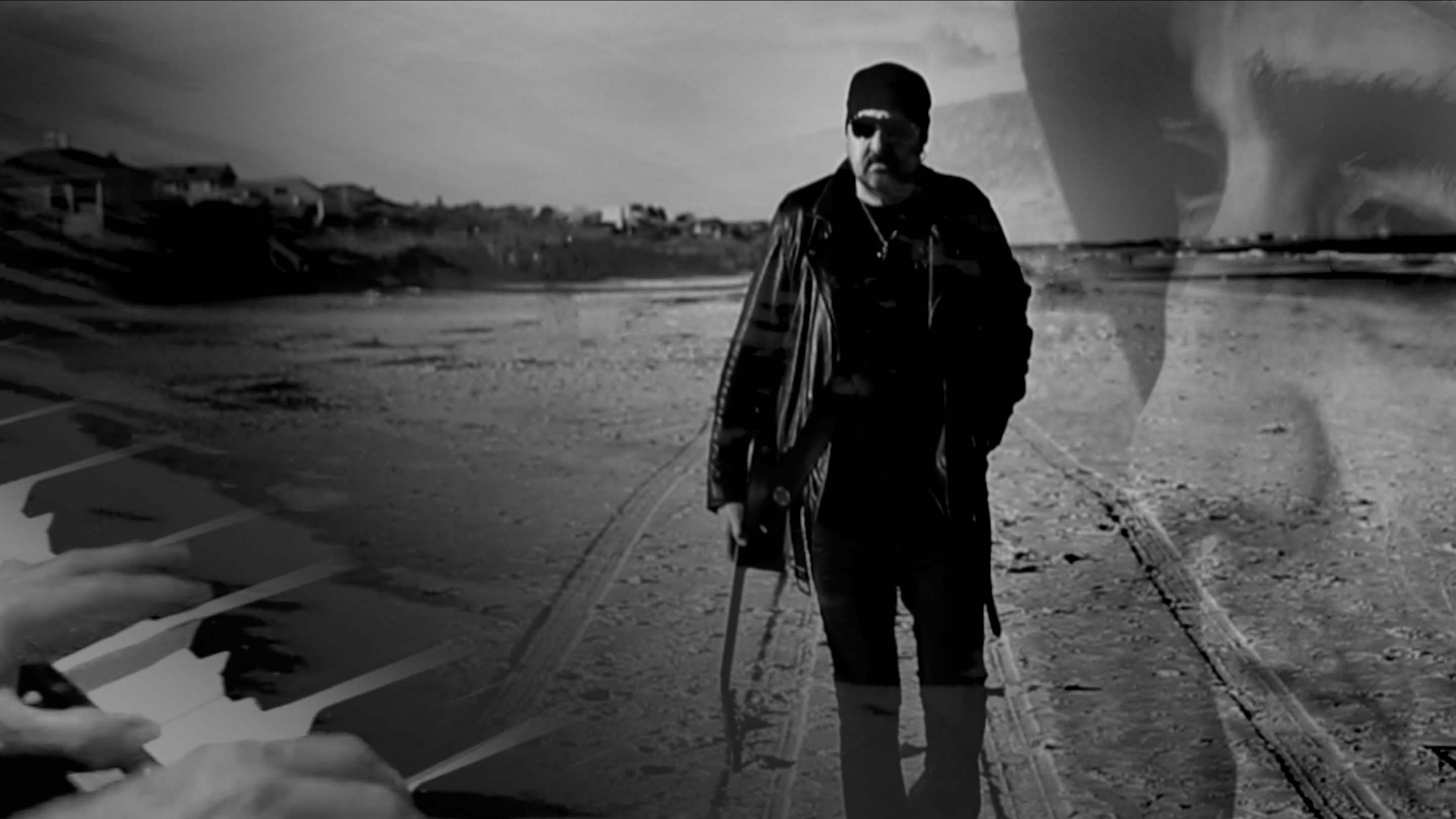 This frame grab is from the Just A Girl video. Beaches a continent apart, Jacksonville Beach in Florida and Golden Gardens Beach in Seattle - The Bolshoi Brothers